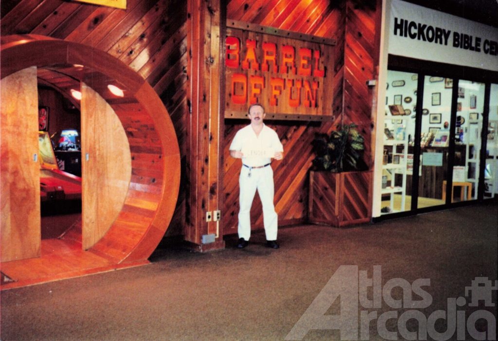 Store manager Dennis Moore stands outside Barrel of Fun #06 in Lenoir Mall, Lenoir, NC in 1987