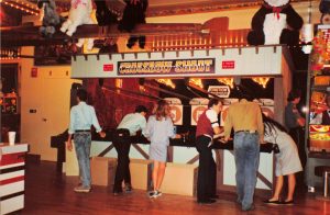 Customers playing Crossbow Shoot at Commander Ragtime's, Barrel of Fun #13