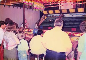 Customers playing Horse Race Roll Down game at Barrel of Fun #13, Commander Ragtime's